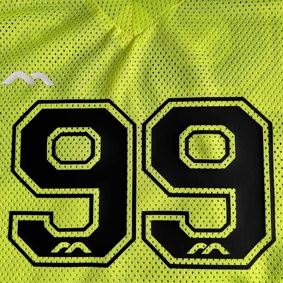 Yellow Mesh Mercian Field Hockey Jersey Number 99 front