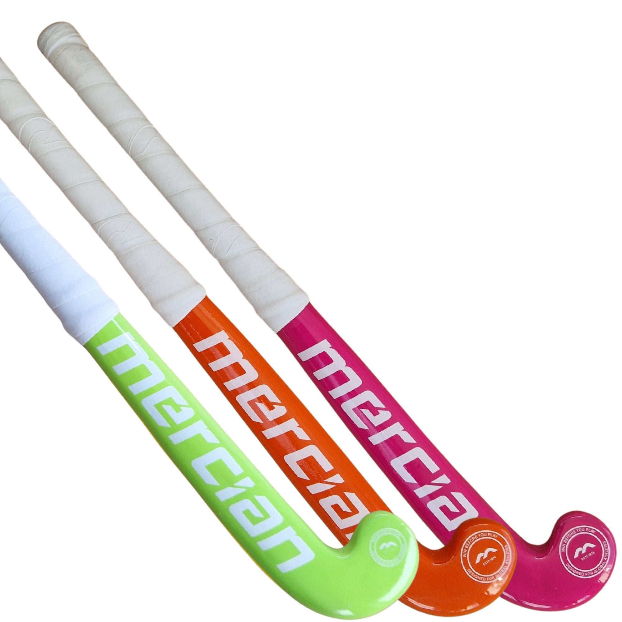 Three field hockey sticks with Mercian branding in green, orange, and pink, arranged diagonally on a plain white background.