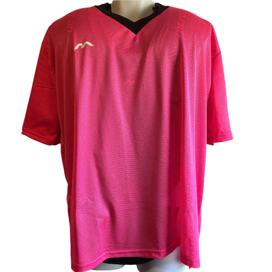 Pink sports jersey on a mannequin against a white background