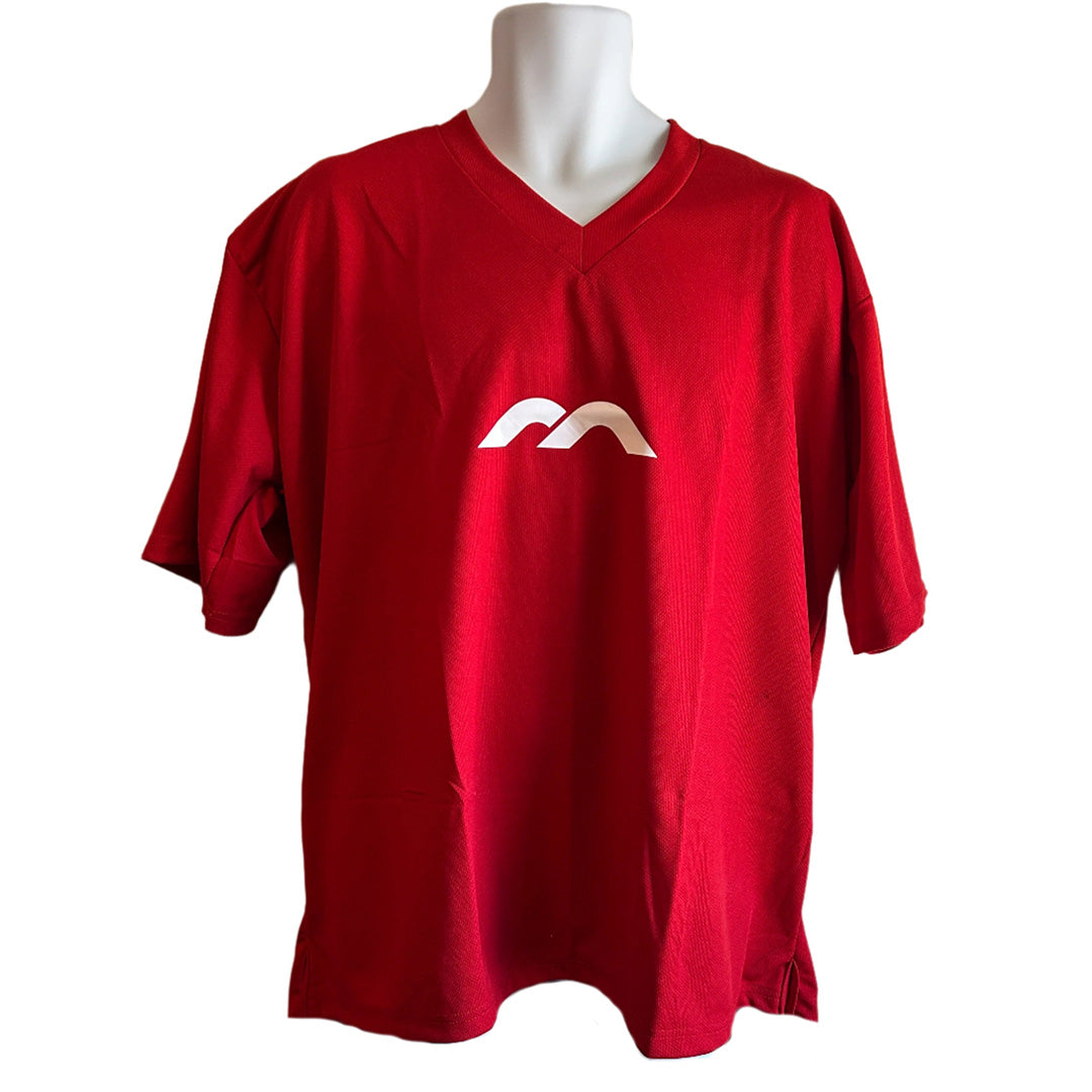Red GK jersey with a white logo against a white background