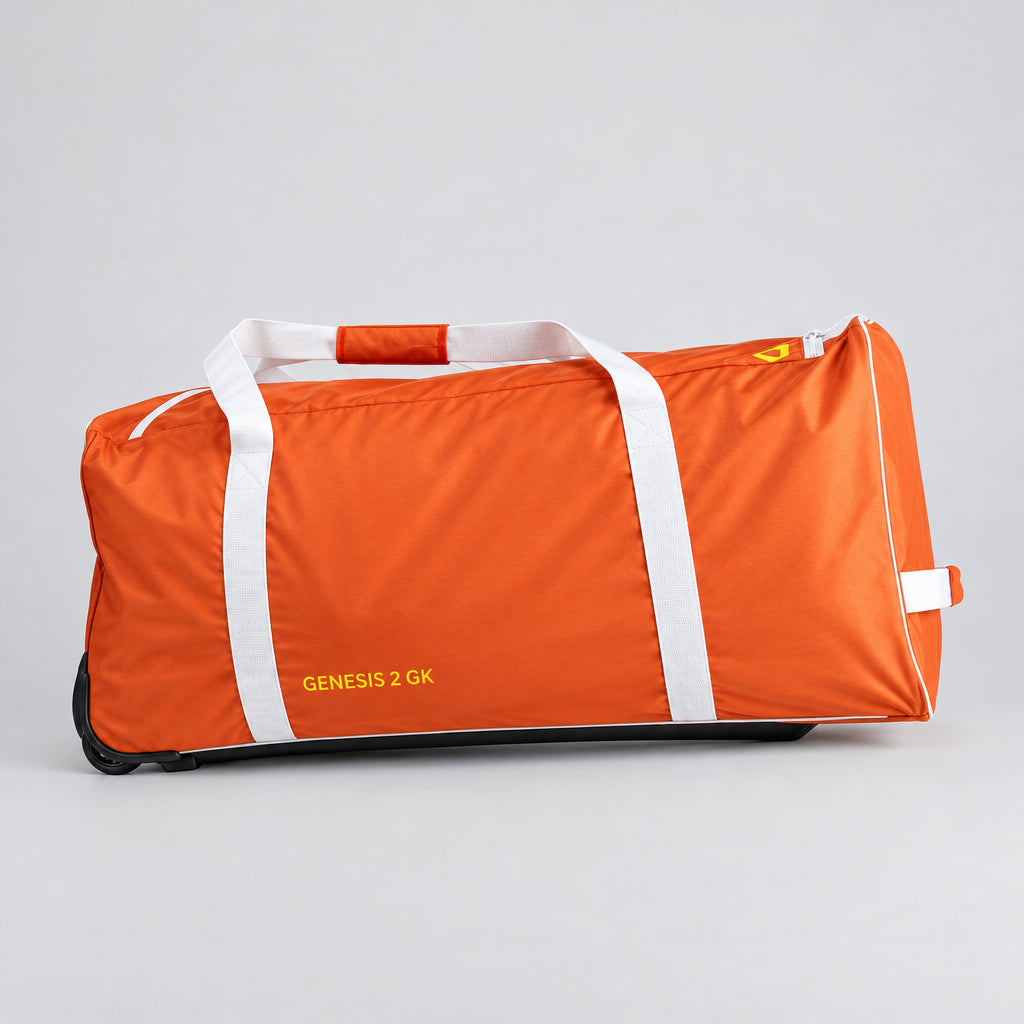 Mercian HOGE226GKORG orange goalkeeper wheelie bag angled side view with Genesis 2 GK branding and padded carry handles.