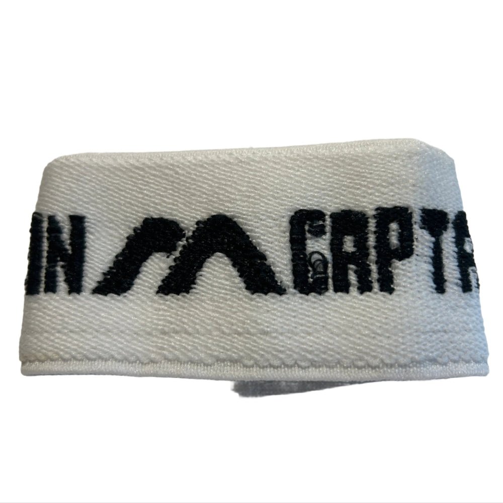 White captains armband with black text 