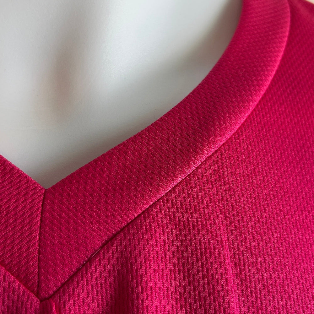 Close-up of a pink garment on a mannequin