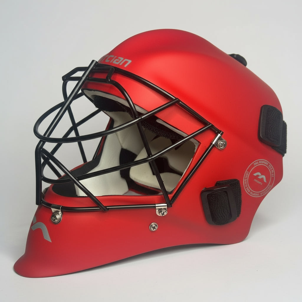 Red helmet with a black face guard on a white background