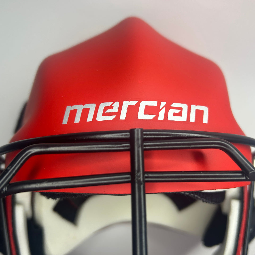 Red helmet with black face guard and 'mercian' branding on a white background