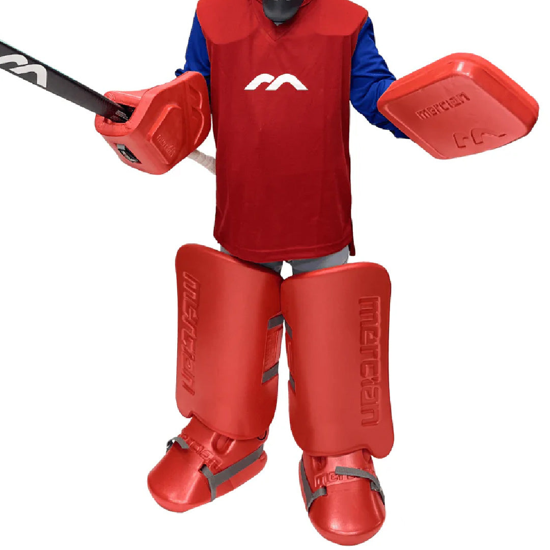 Person wearing red field hockey gear with a red jersey on a white background