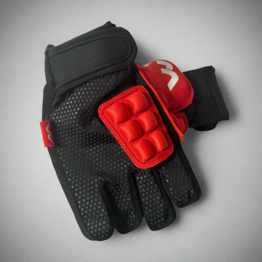 Black glove with red padding on a white background